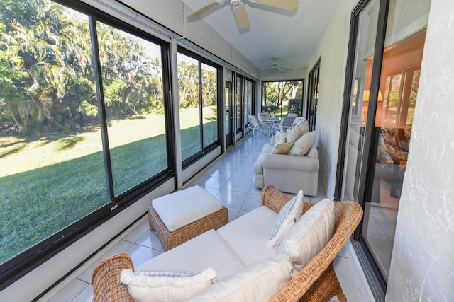 sunroom / solarium with ceiling fan and a healthy amount of sunlight