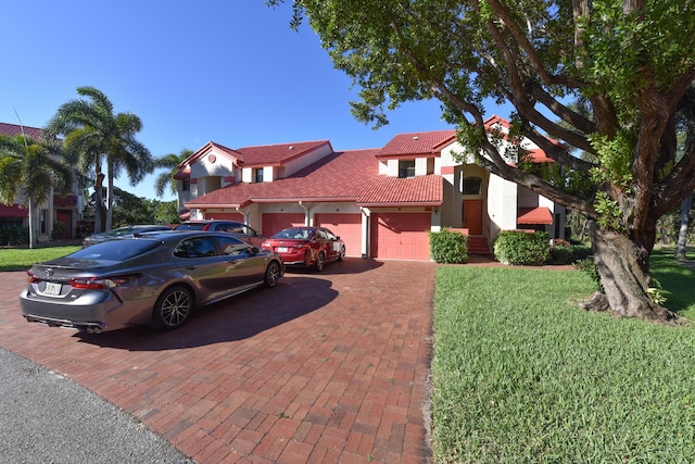 view of front of property with a front lawn