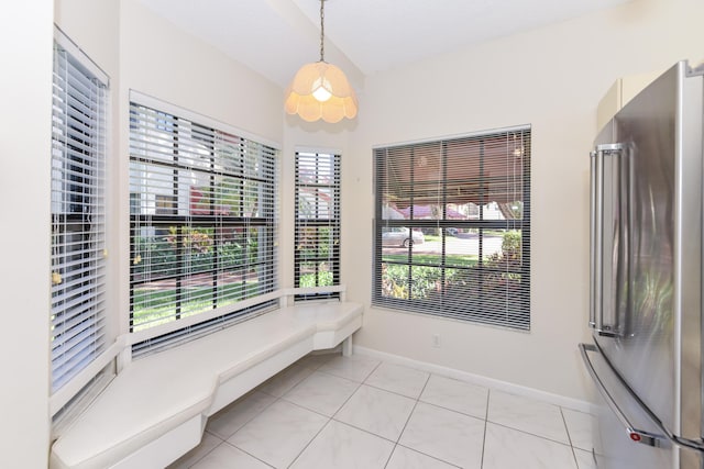 unfurnished room with light tile patterned floors