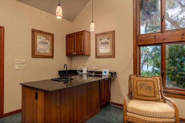 office area featuring sink and vaulted ceiling