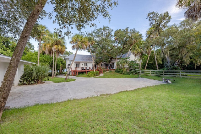 view of yard featuring a wooden deck