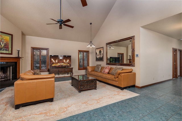 tiled living room with high vaulted ceiling and ceiling fan with notable chandelier