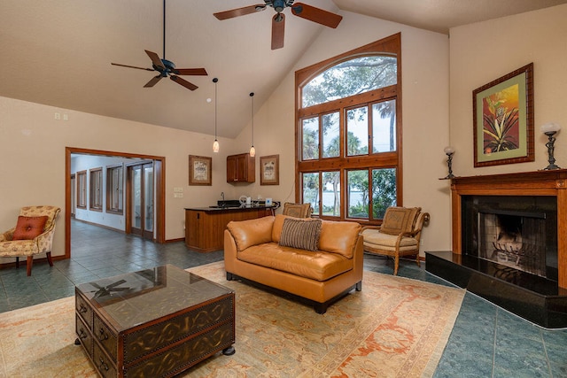 tiled living room with high vaulted ceiling and ceiling fan