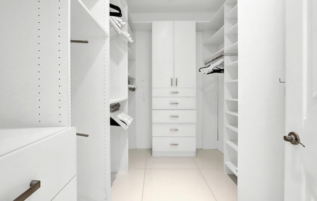 walk in closet featuring light tile patterned floors