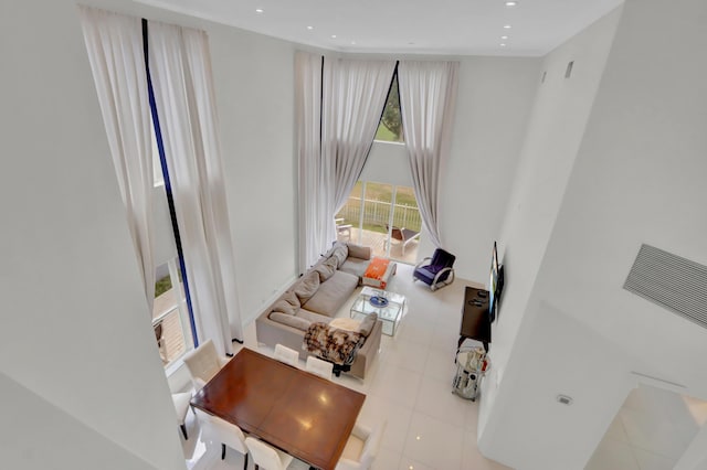 living room featuring light tile patterned flooring