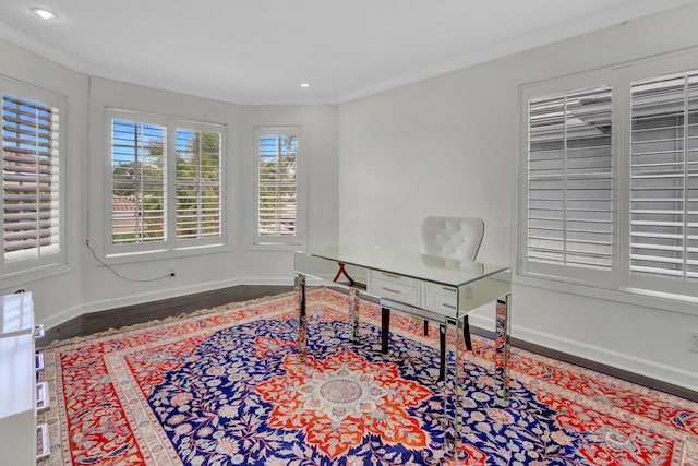 home office featuring hardwood / wood-style flooring and crown molding