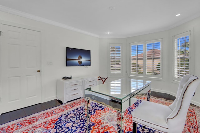 office featuring hardwood / wood-style flooring, ornamental molding, and a wealth of natural light