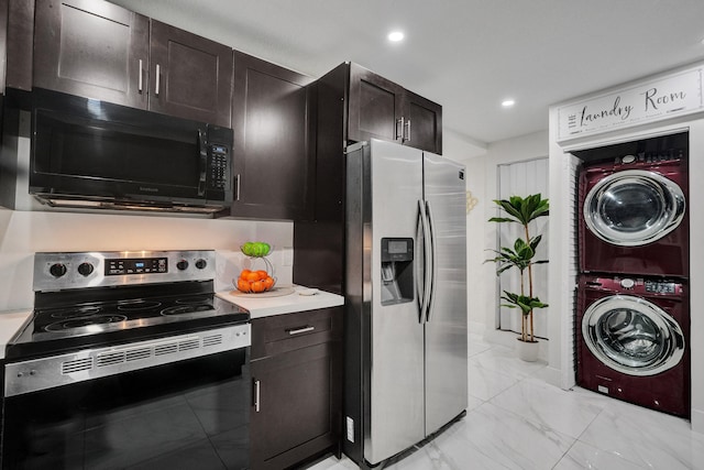 kitchen featuring dark brown cabinetry, stacked washer and dryer, and appliances with stainless steel finishes