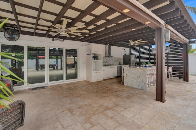 view of patio / terrace with ceiling fan