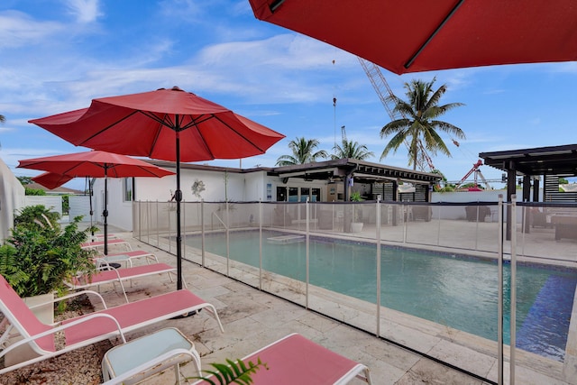 view of pool featuring a patio