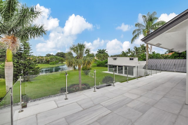 view of patio / terrace featuring a water view