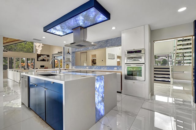 kitchen featuring island range hood, stainless steel double oven, black electric cooktop, a spacious island, and sink