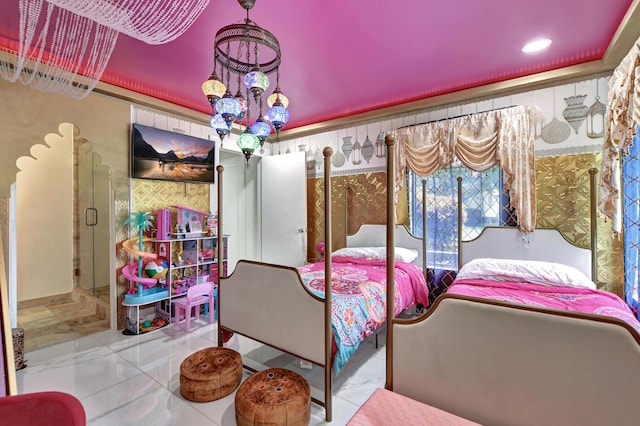 tiled bedroom featuring a notable chandelier