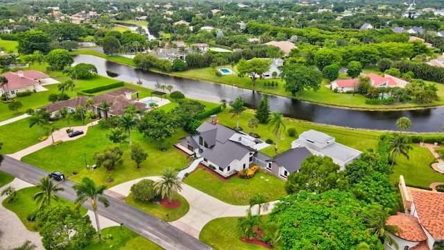 bird's eye view with a water view