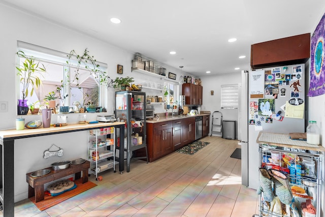 kitchen with dishwasher and white refrigerator