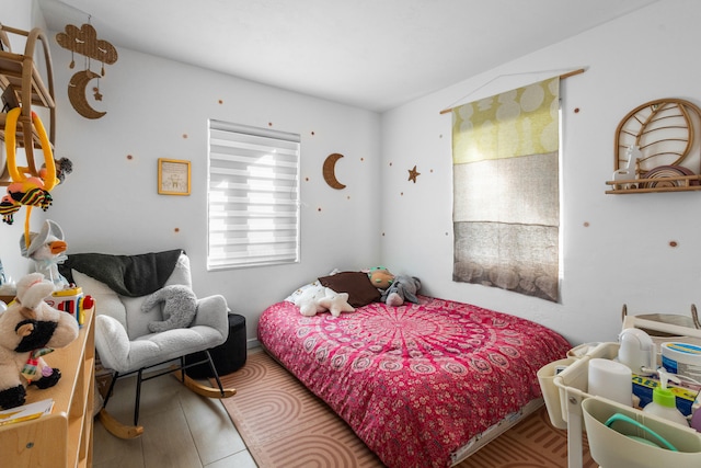 bedroom featuring lofted ceiling