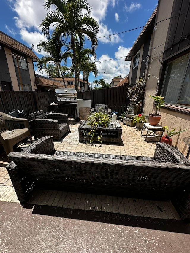 view of patio / terrace with outdoor lounge area and area for grilling