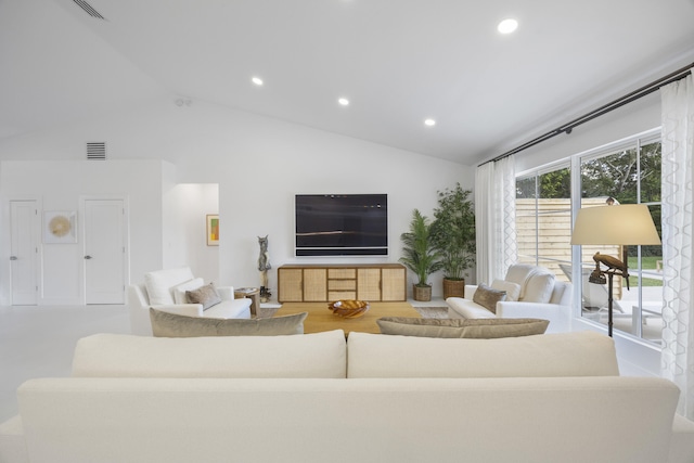 living room featuring lofted ceiling