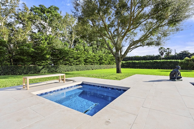 view of pool with a patio, a yard, and an in ground hot tub