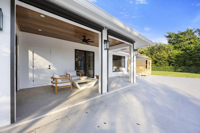 view of patio featuring ceiling fan