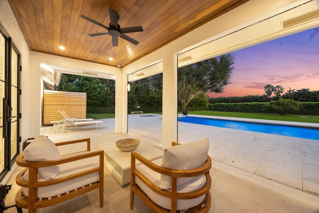 exterior space with a patio and ceiling fan