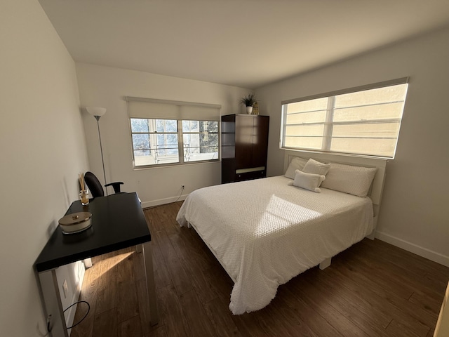 bedroom featuring dark hardwood / wood-style floors