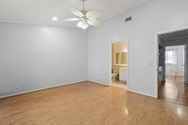 unfurnished bedroom with ensuite bath, ornamental molding, light hardwood / wood-style floors, and ceiling fan