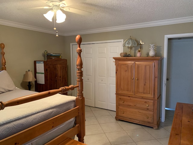 bedroom featuring a textured ceiling, ceiling fan, and crown molding