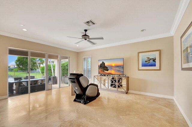 living room with ceiling fan with notable chandelier and ornamental molding