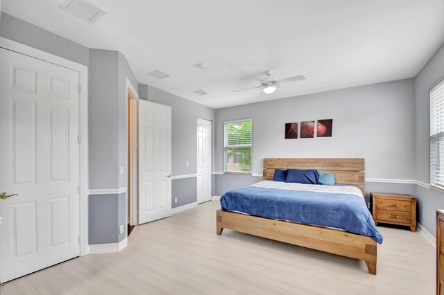 bathroom featuring vanity, plenty of natural light, and crown molding