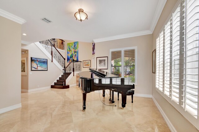 dining room featuring ornamental molding