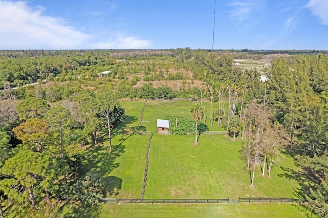 birds eye view of property with a rural view