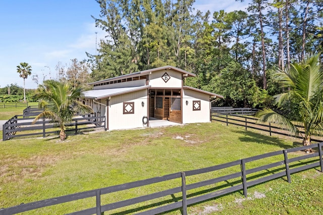 view of outbuilding featuring a rural view