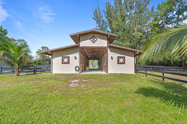 view of outdoor structure featuring a yard