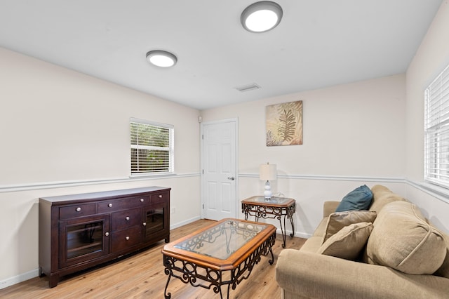 sitting room featuring light wood-type flooring