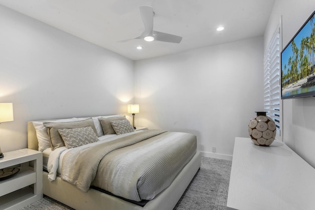 carpeted bedroom with ceiling fan