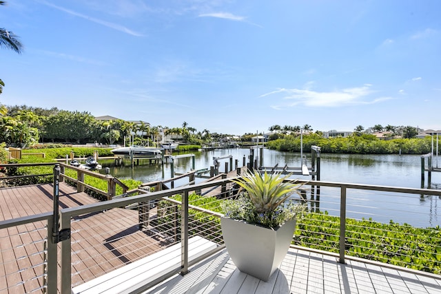 exterior space featuring a water view and a dock