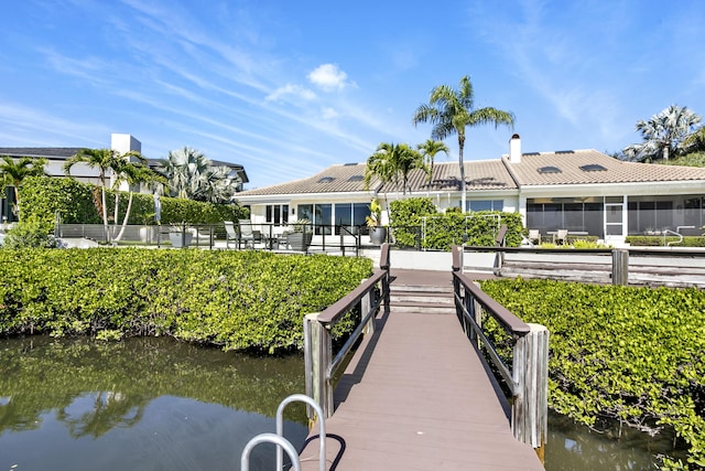 dock area featuring a water view