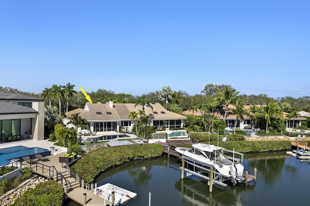 exterior space featuring a patio and a water view