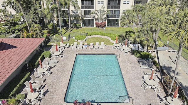 view of swimming pool featuring a patio area