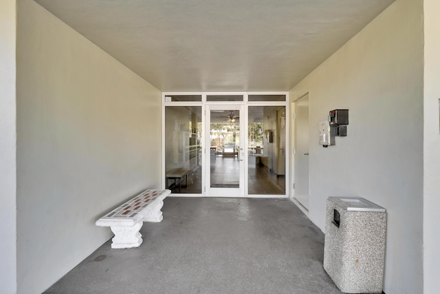 view of exterior entry featuring french doors