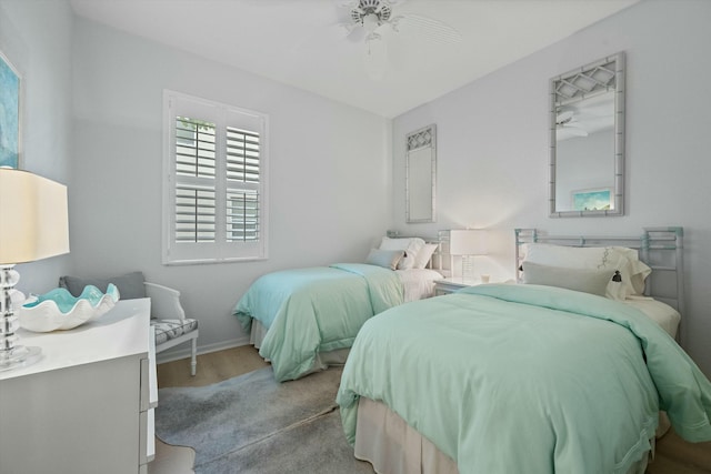 bedroom featuring ceiling fan and light wood-type flooring