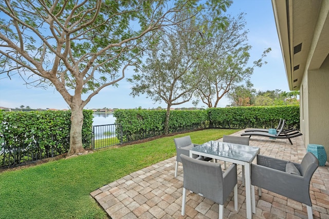 view of patio / terrace featuring a water view