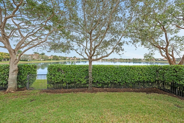 view of yard with a water view