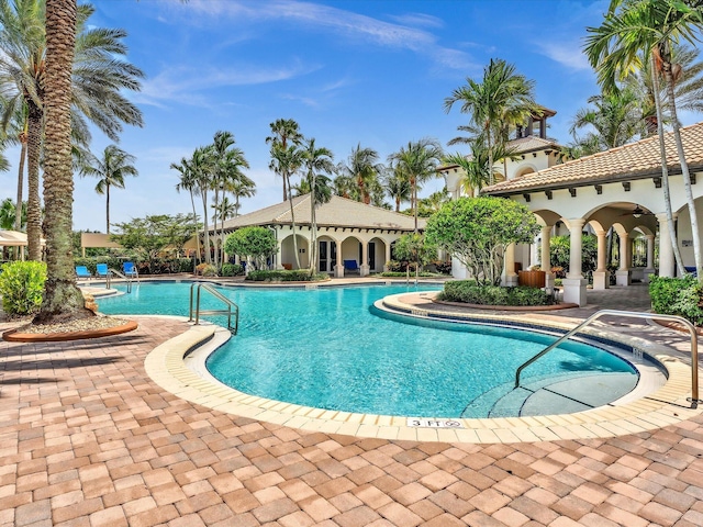 view of pool featuring a patio area