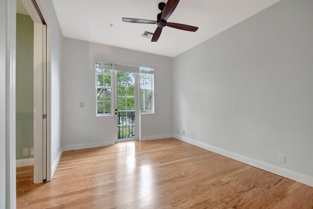 empty room with light hardwood / wood-style floors and ceiling fan