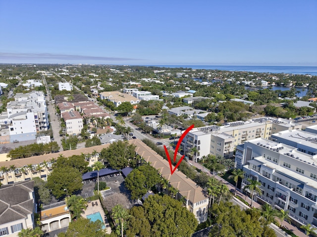 birds eye view of property featuring a water view