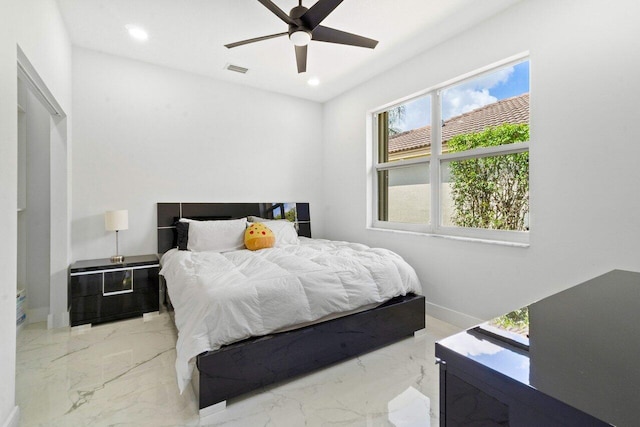 bedroom featuring ceiling fan