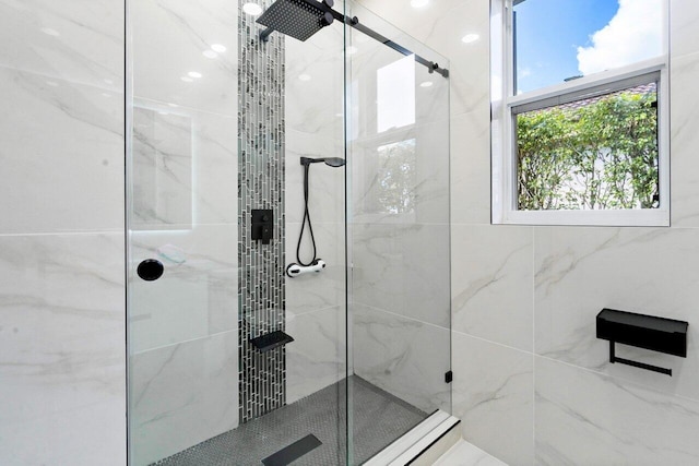 bathroom with an enclosed shower