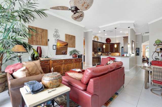 living area with baseboards, ornamental molding, light tile patterned floors, recessed lighting, and a ceiling fan